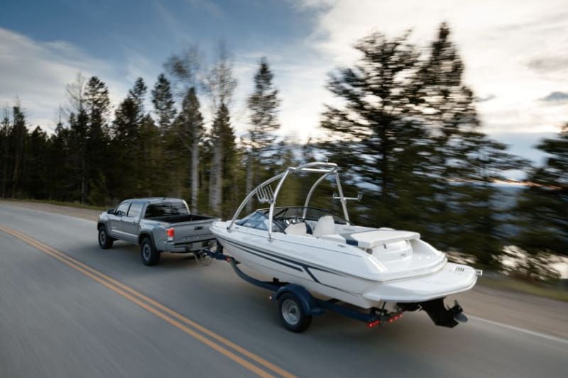 Truck towing boat