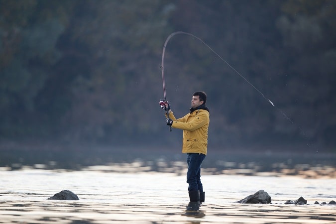 fisherman-casting-on-river